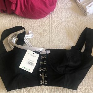 Mistress rocks very cropped black shirt